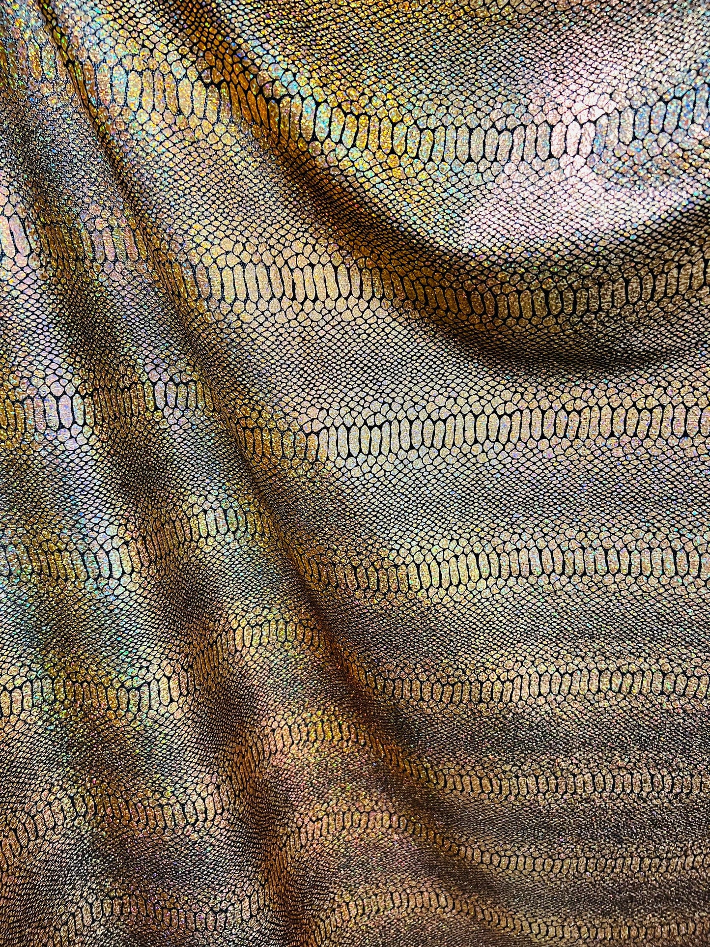 Exotic Snake design metallic poly spandex fabric 4-way stretch 58/60” Sold by the YD. Ships worldwide from Los Angeles California USA