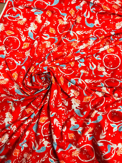 Mermaid design print on best quality of nylon spandex 4-way stretch 58/60” Sold by the YD. Ships worldwide from Los Angeles California USA.