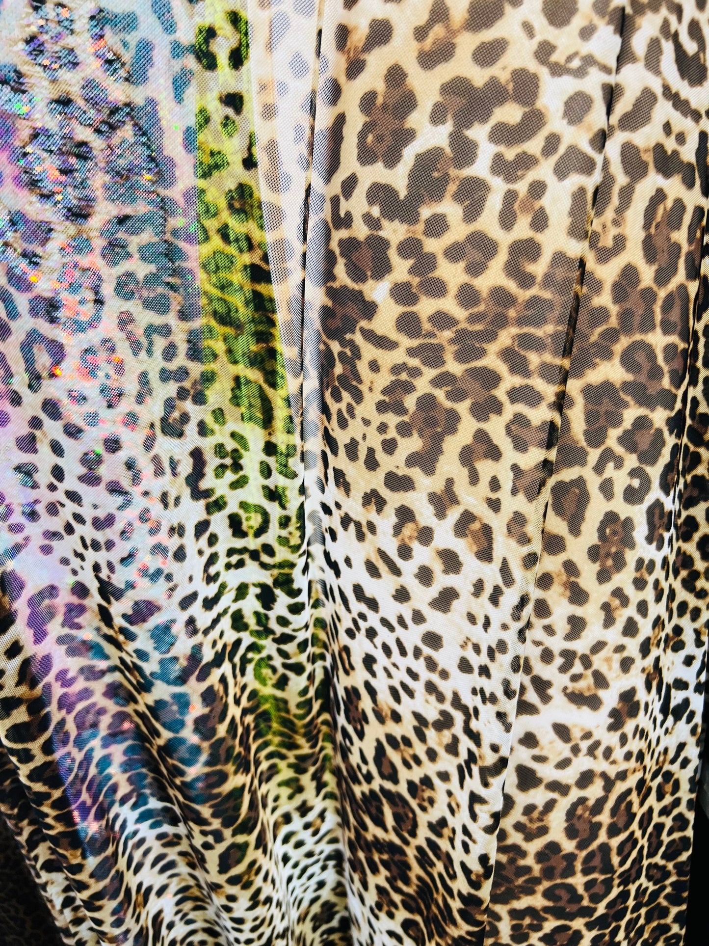 Leopard design print on great quality of power mesh 4-way stretch 58/60” Sold by the YD. Ships worldwide from Los Angeles California USA.