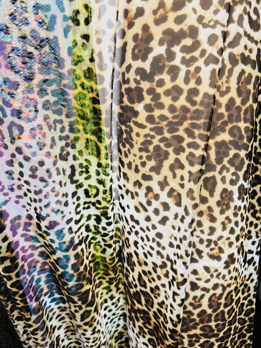 Leopard design print on great quality of power mesh 4-way stretch 58/60” Sold by the YD. Ships worldwide from Los Angeles California USA.