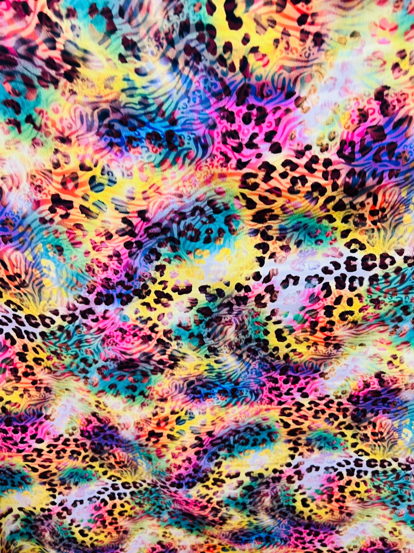 New exotic animal print multicolor print on great quality of nylon spandex 4-way stretch 58/60” Sold by the YD. Ships worldwide from L.A CA