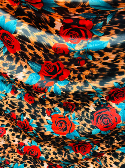 Exotic Leopard design with red flowers print on great quality of nylon spandex 4-way stretch 58/60” Sold by the YD. Ships worldwide from L.A