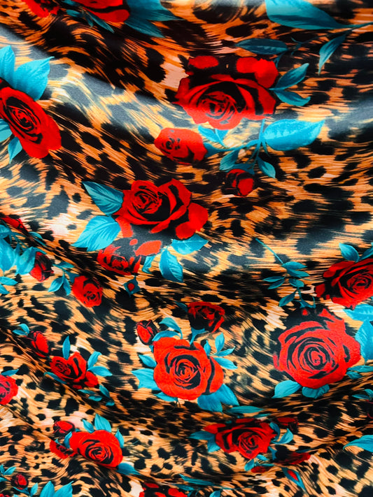 Exotic Leopard design with red flowers print on great quality of nylon spandex 4-way stretch 58/60” Sold by the YD. Ships worldwide from L.A