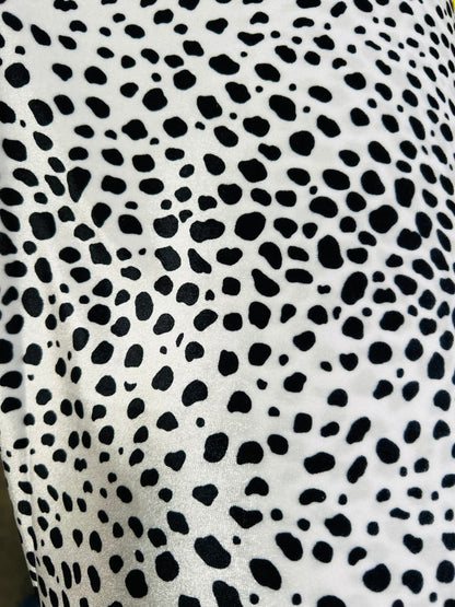 Dalmatian design print on best quality of stretch velvet 4-way stretch 58/60” Sold by the YD. Ships worldwide from Los Angeles California US