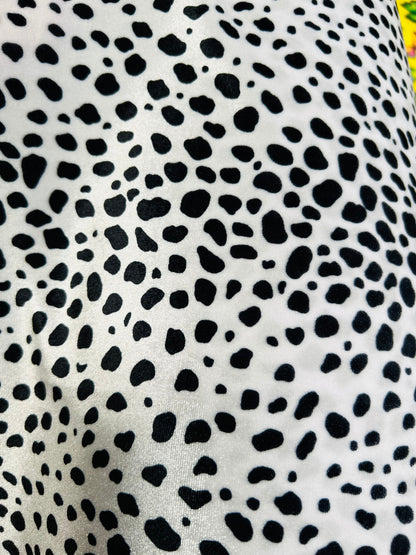 Dalmatian design print on best quality of stretch velvet 4-way stretch 58/60” Sold by the YD. Ships worldwide from Los Angeles California US