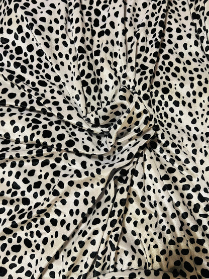 New Dalmatian design print on best quality of stretch velvet 4-way stretch 58/60” Sold by the YD. Ships worldwide from Los Angeles CA USA