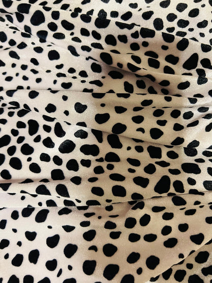 New Dalmatian design print on best quality of stretch velvet 4-way stretch 58/60” Sold by the YD. Ships worldwide from Los Angeles CA USA