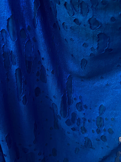 Mummy design sapphire and orange color  poly spandex 4-way stretch 58/60” Sold by the YD. Ships Worldwide from Los Angeles California