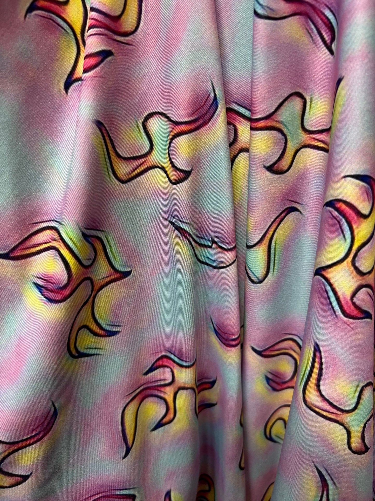 Flames design Multicolor print on poly spandex 4-way stretch 58/60” Sold by the YD. Ships Worldwide from Los Angeles California USA.