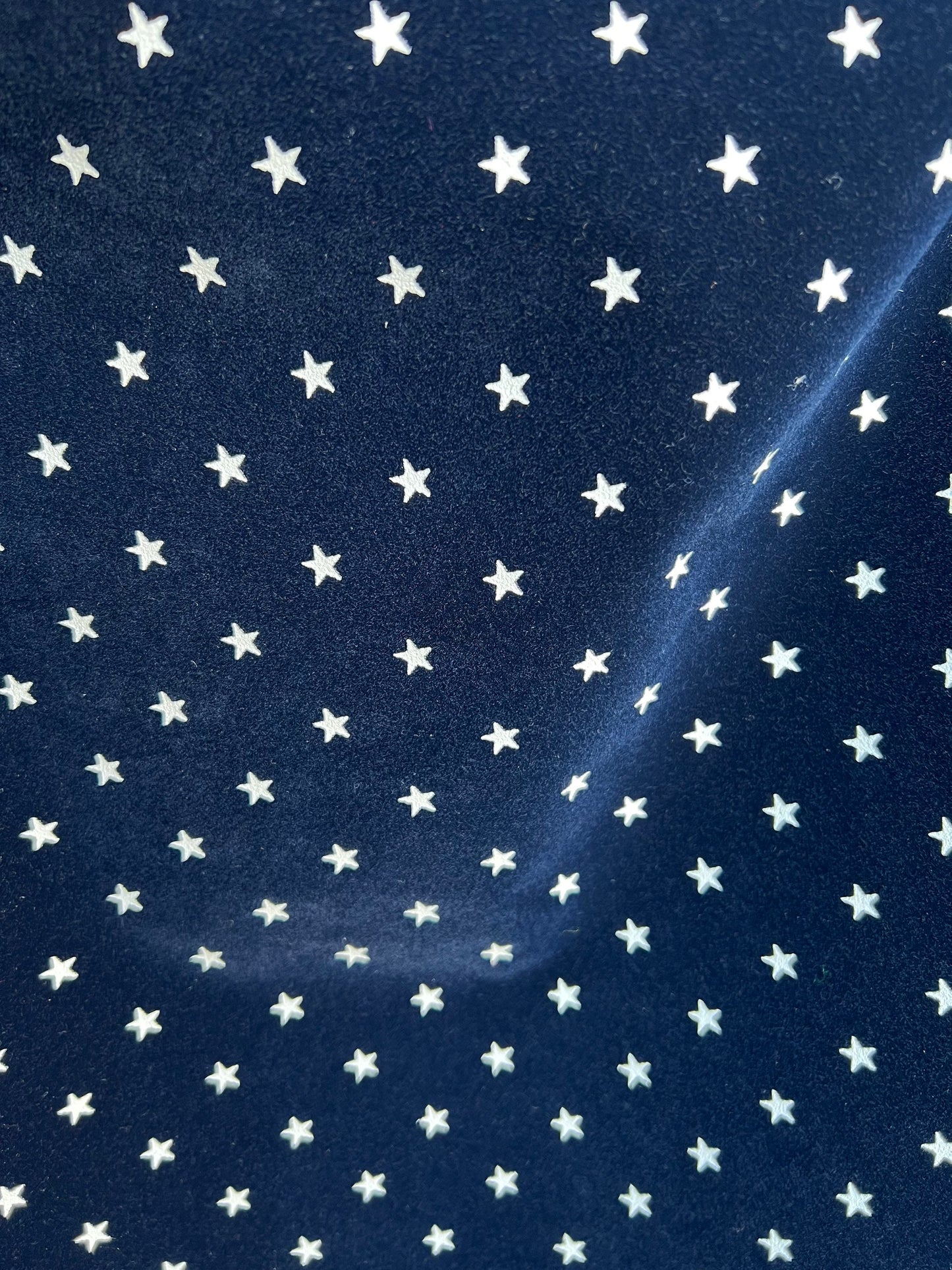 Flocking velvet with white stars non stretch fabric Royal/white 58/60” Sold by the YD. Ships Worldwide from Los Angeles California USA.