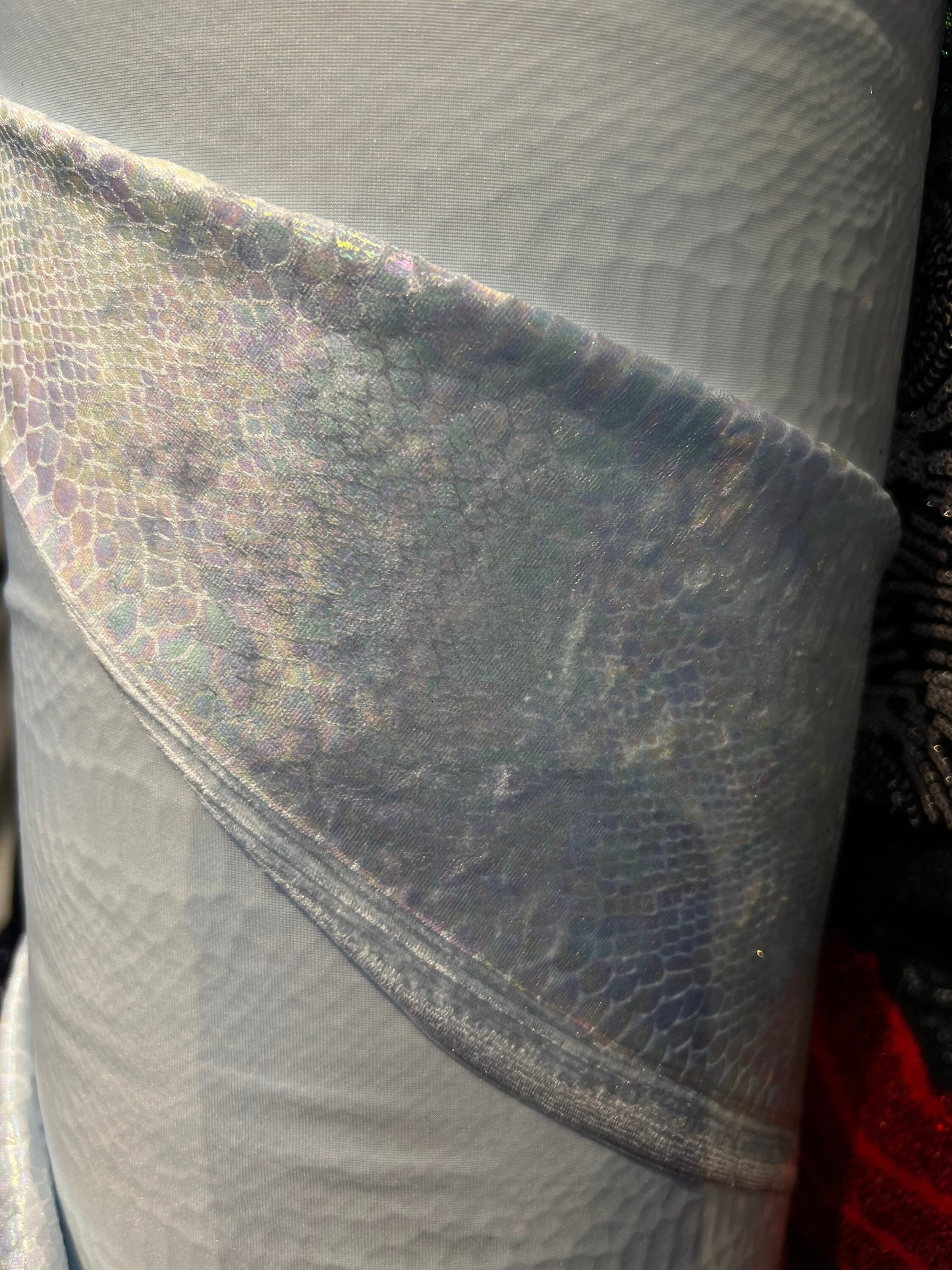 Snake design iridescent foil on stretch velvet 4-way stretch 58/60” Sold by the YD. Ships Worldwide from Los Angeles California USA.