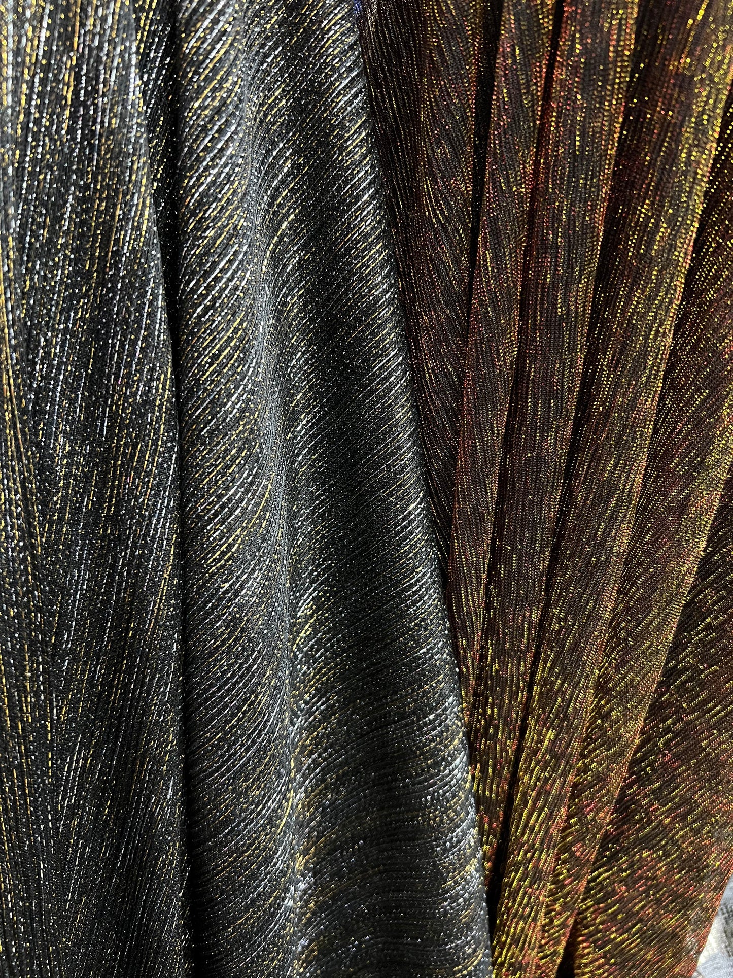 Pleated metallic stretch mesh 4way stretch 58/60” Sold by the YD. Ships worldwide from Los Angeles California USA.