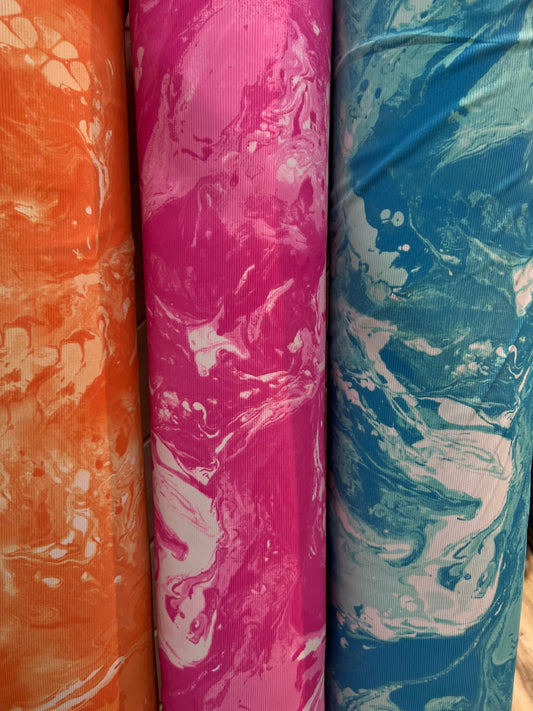 New tie dye ribbed nylon spandex 4-way stretch 58/60” Sold by the YD. Ships Worldwide from Los Angeles California USA.