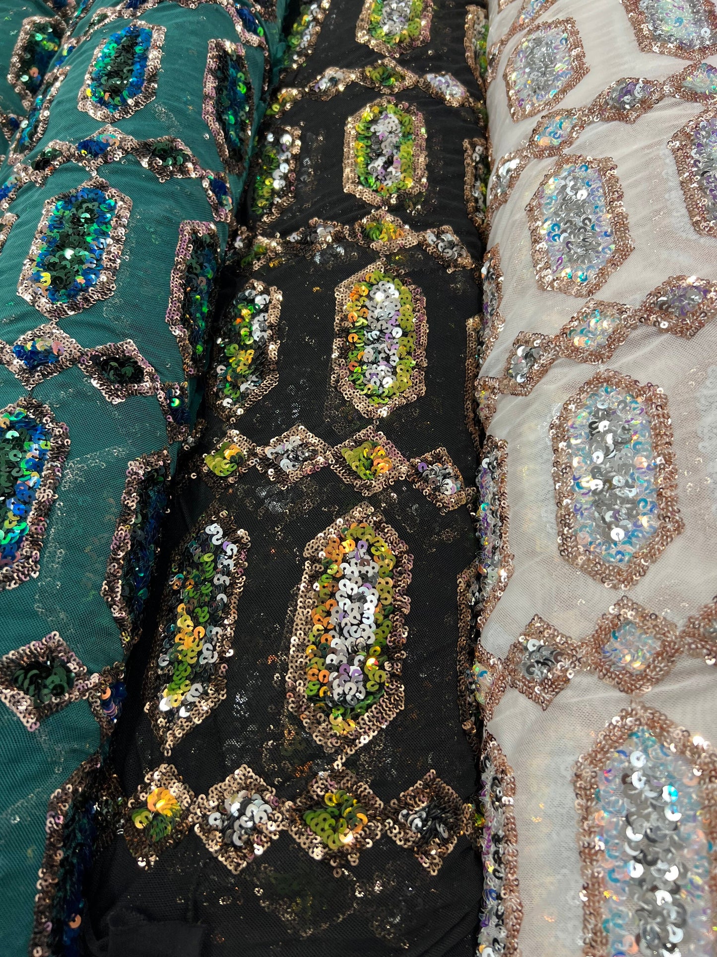 Luxury Geometric Iridescent sequins on stretch mesh 2-way 50/52” Sold by the YD. Ships worldwide from Los Angeles California USA.