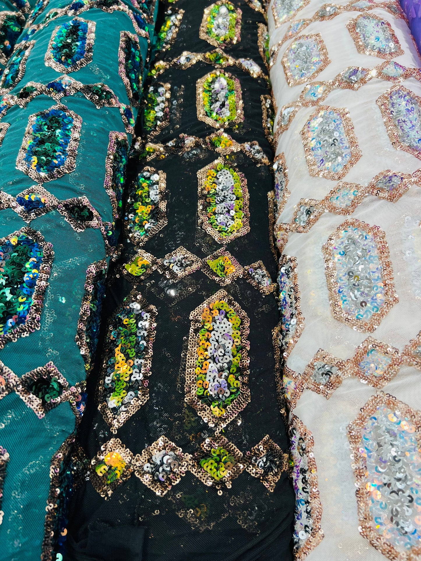 Luxury Geometric Iridescent sequins on stretch mesh 2-way 50/52” Sold by the YD. Ships worldwide from Los Angeles California USA.