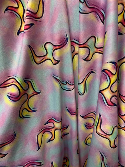 Flames design Multicolor print on poly spandex 4-way stretch 58/60” Sold by the YD. Ships Worldwide from Los Angeles California USA.