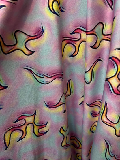 Flames design Multicolor print on poly spandex 4-way stretch 58/60” Sold by the YD. Ships Worldwide from Los Angeles California USA.