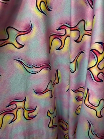 Flames design Multicolor print on poly spandex 4-way stretch 58/60” Sold by the YD. Ships Worldwide from Los Angeles California USA.