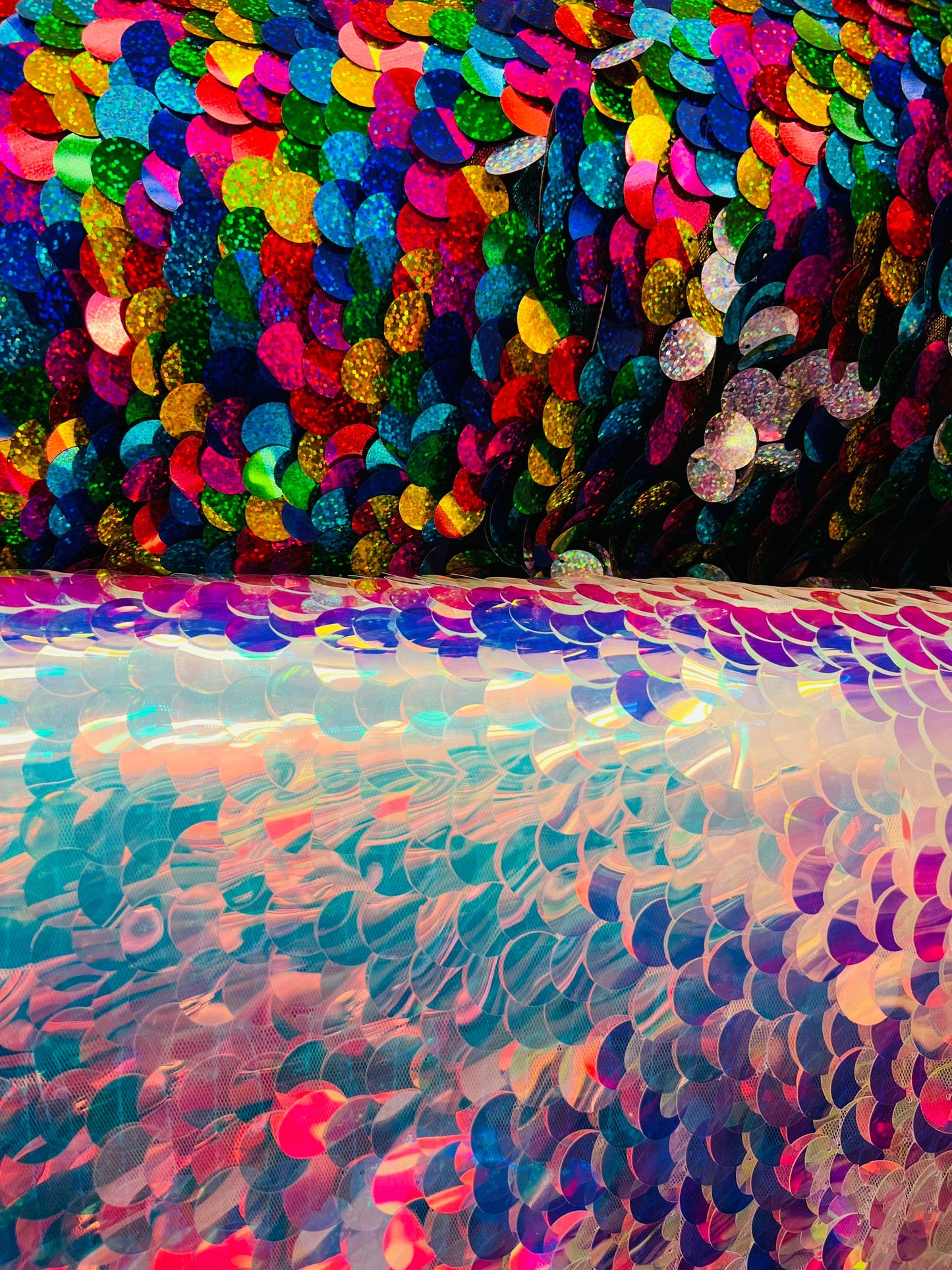 Paillette circle iridescent and multi sequins on stretch mesh base. Sold by the yd ships worldwide from Los Angeles CA