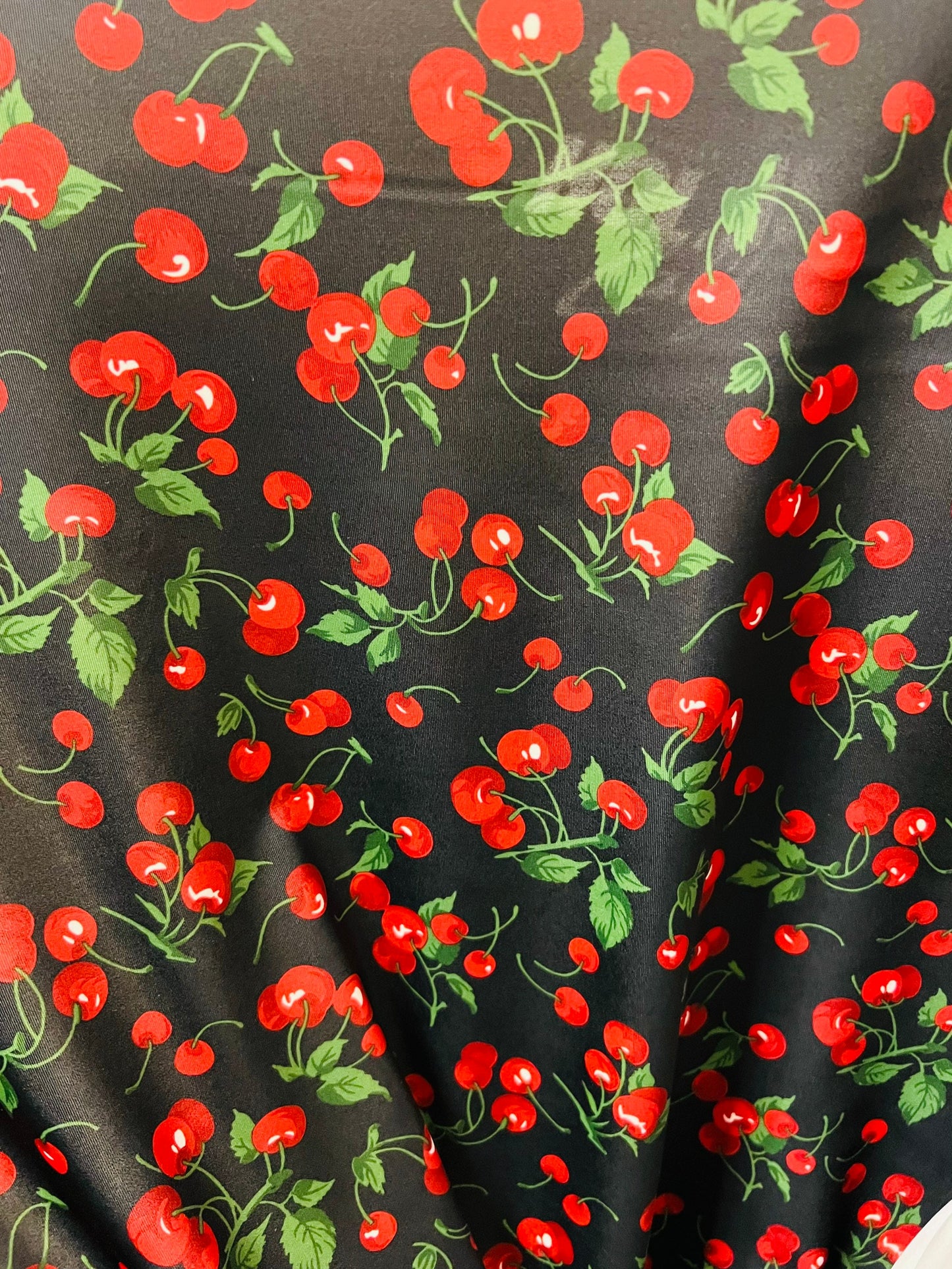 Cherry design Black/Red print on great quality of nylon spandex 4-way stretch 58/60” Sold by the YD. Ships Worldwide from Los Angeles CA