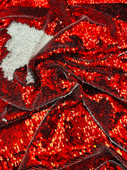 Mermaid sequins red/white reversible sequins embroidered on spandex base 2-way stretch 55/57” Sold by the YD. Ships Worldwide from Los Angel