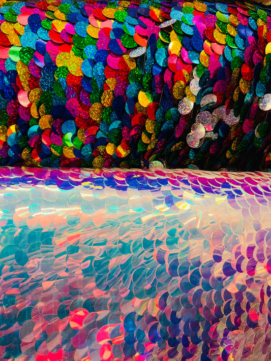 Paillette circle white iridescent and multi color sequins on stretch mesh base. Sold by the yd ships worldwide