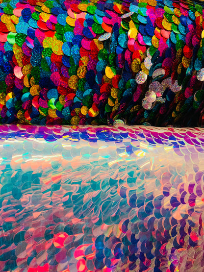 Paillette circle white iridescent and multi color sequins on stretch mesh base. Sold by the yd ships worldwide