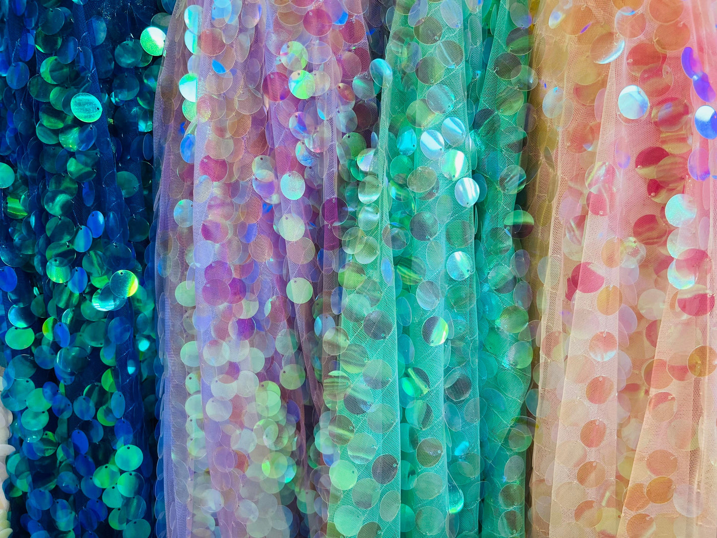 Paillette sequins iridescent multicolors embroidered on stretch mesh base 2-way stretch Sold by the yd ships worldwide