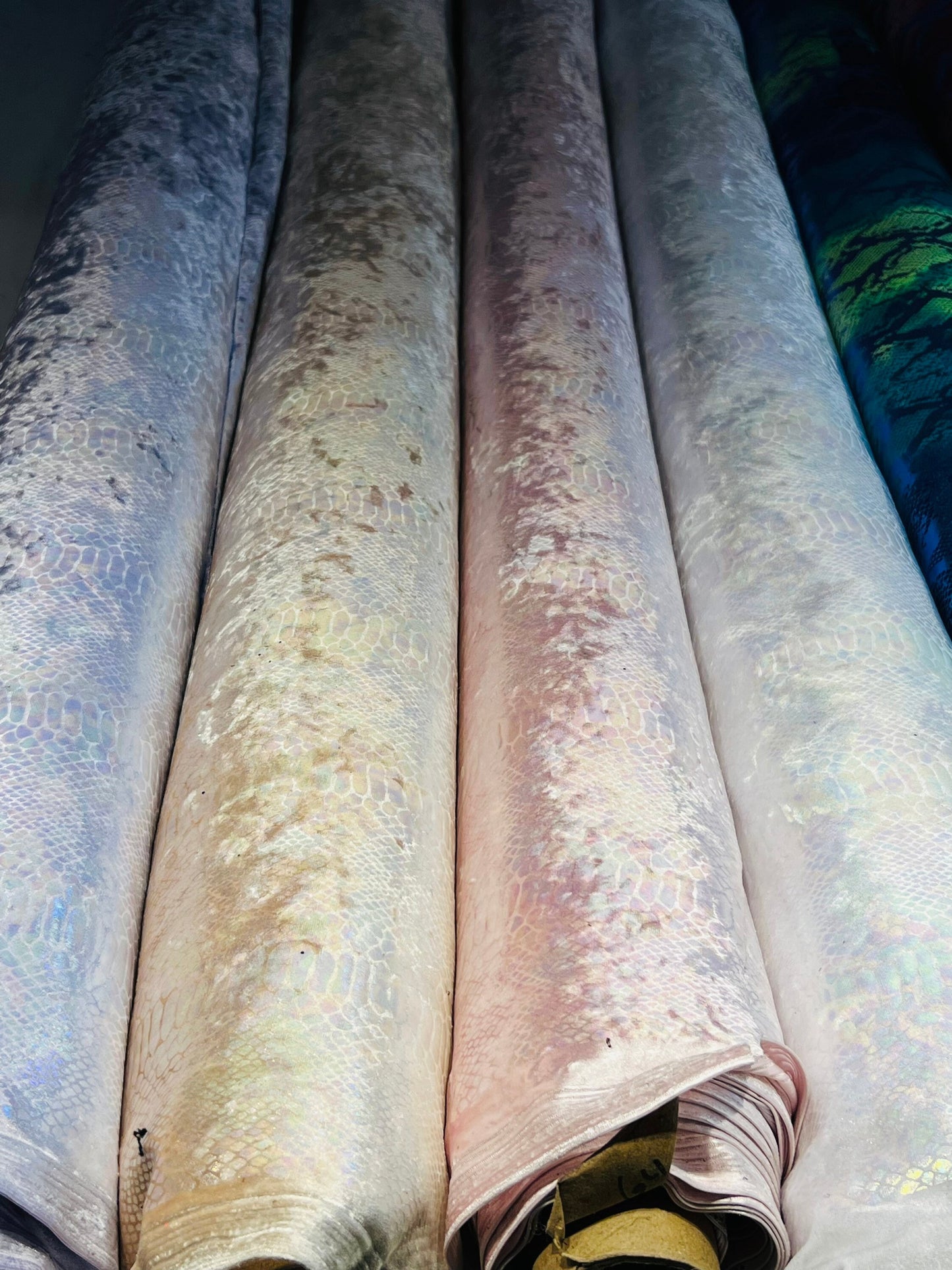 Snake design iridescent foil on stretch velvet 4-way stretch 58/60” Sold by the YD. Ships Worldwide from Los Angeles California USA.