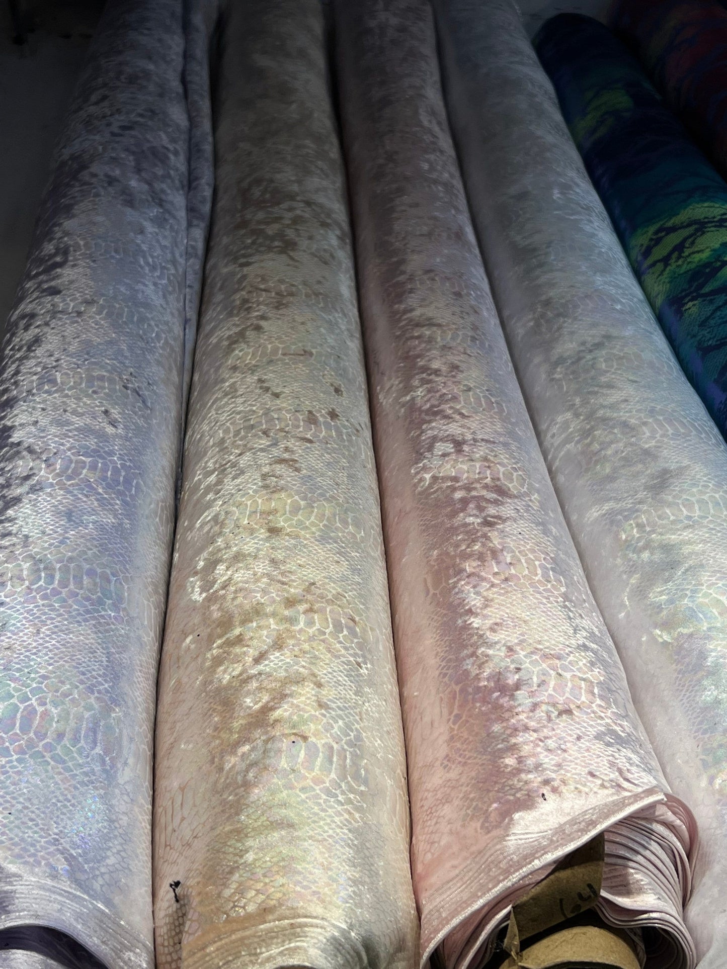 Snake design iridescent foil on stretch velvet 4-way stretch 58/60” Sold by the YD. Ships Worldwide from Los Angeles California USA.