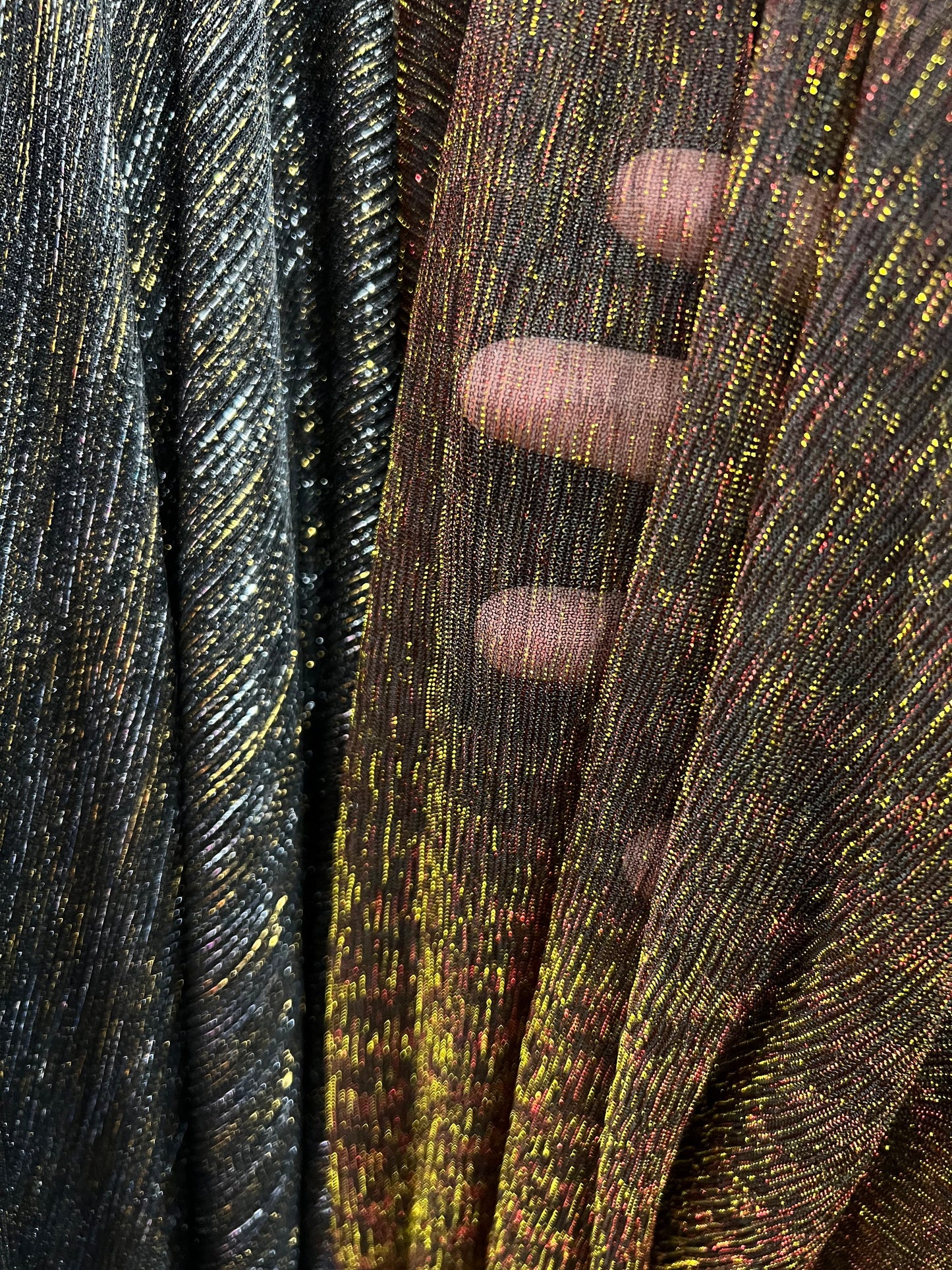 Pleated metallic stretch mesh 4way stretch 58/60” Sold by the YD. Ships worldwide from Los Angeles California USA.