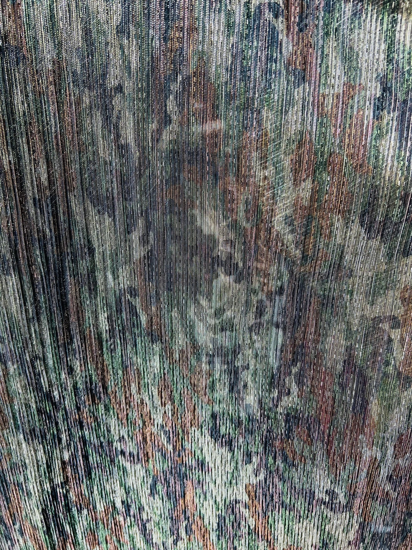 New camouflage design print on metallic mesh pleated 2-way stretch 58/60” Sold by the YD. Ships Worldwide from Los Angeles California USA.