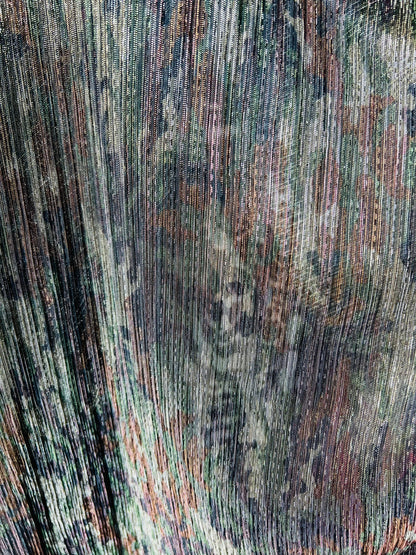New camouflage design print on metallic mesh pleated 2-way stretch 58/60” Sold by the YD. Ships Worldwide from Los Angeles California USA.