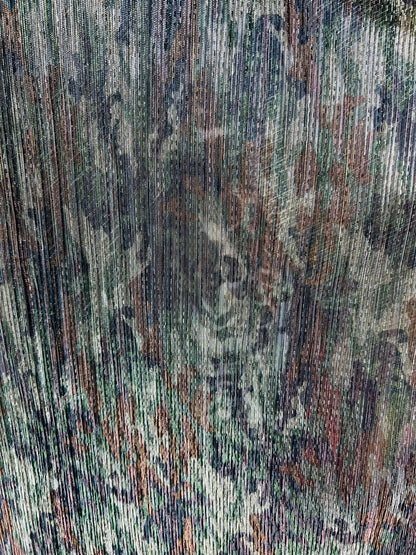 New camouflage design print on metallic mesh pleated 2-way stretch 58/60” Sold by the YD. Ships Worldwide from Los Angeles California USA.
