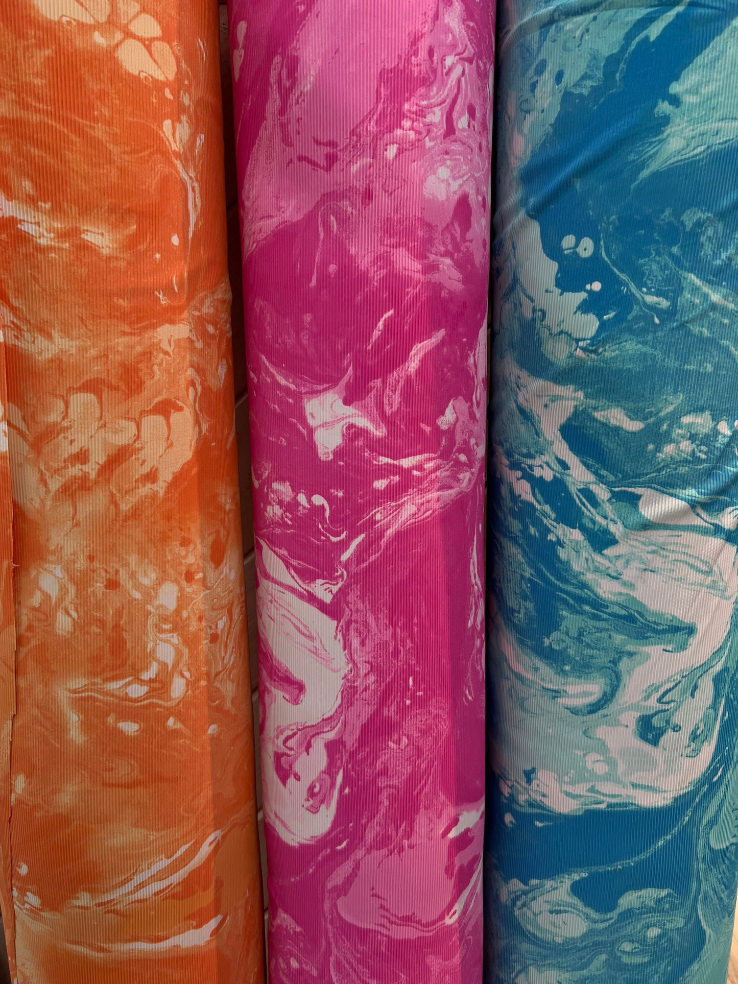 New tie dye ribbed nylon spandex 4-way stretch 58/60” Sold by the YD. Ships Worldwide from Los Angeles California USA.