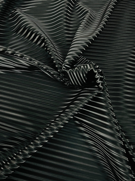 3D Striped super shiny black vinyl 2-way stretch 58/60” Sold by the YD.