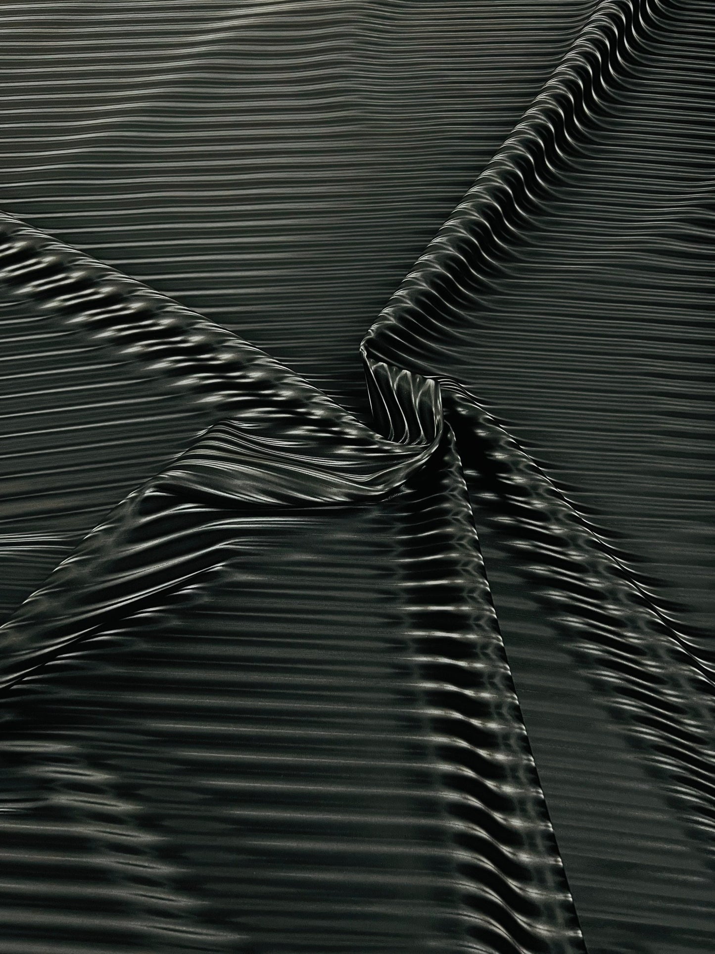 3D Striped super shiny black vinyl 2-way stretch 58/60” Sold by the YD.