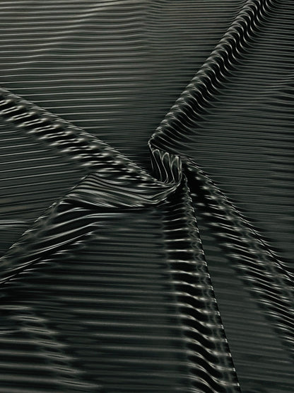 3D Striped super shiny black vinyl 2-way stretch 58/60” Sold by the YD.
