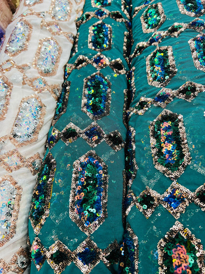 Luxury Geometric Iridescent sequins on stretch mesh 2-way 50/52” Sold by the YD. Ships worldwide from Los Angeles California USA.