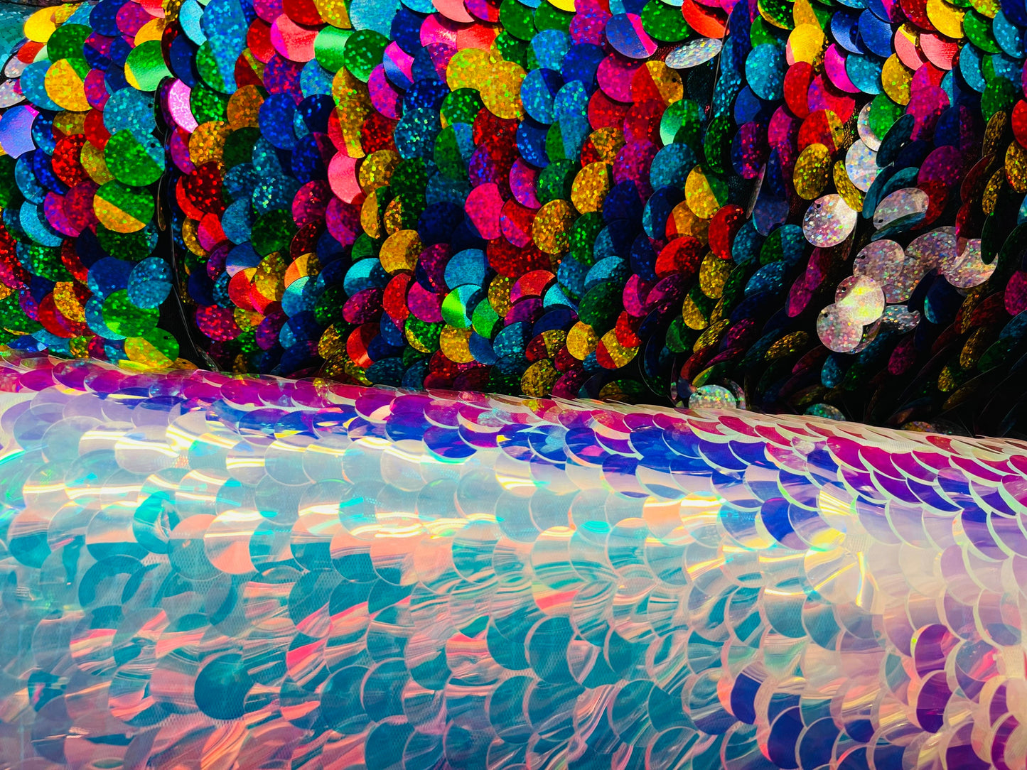 Paillette circle iridescent and multi sequins on stretch mesh base. Sold by the yd ships worldwide from Los Angeles CA