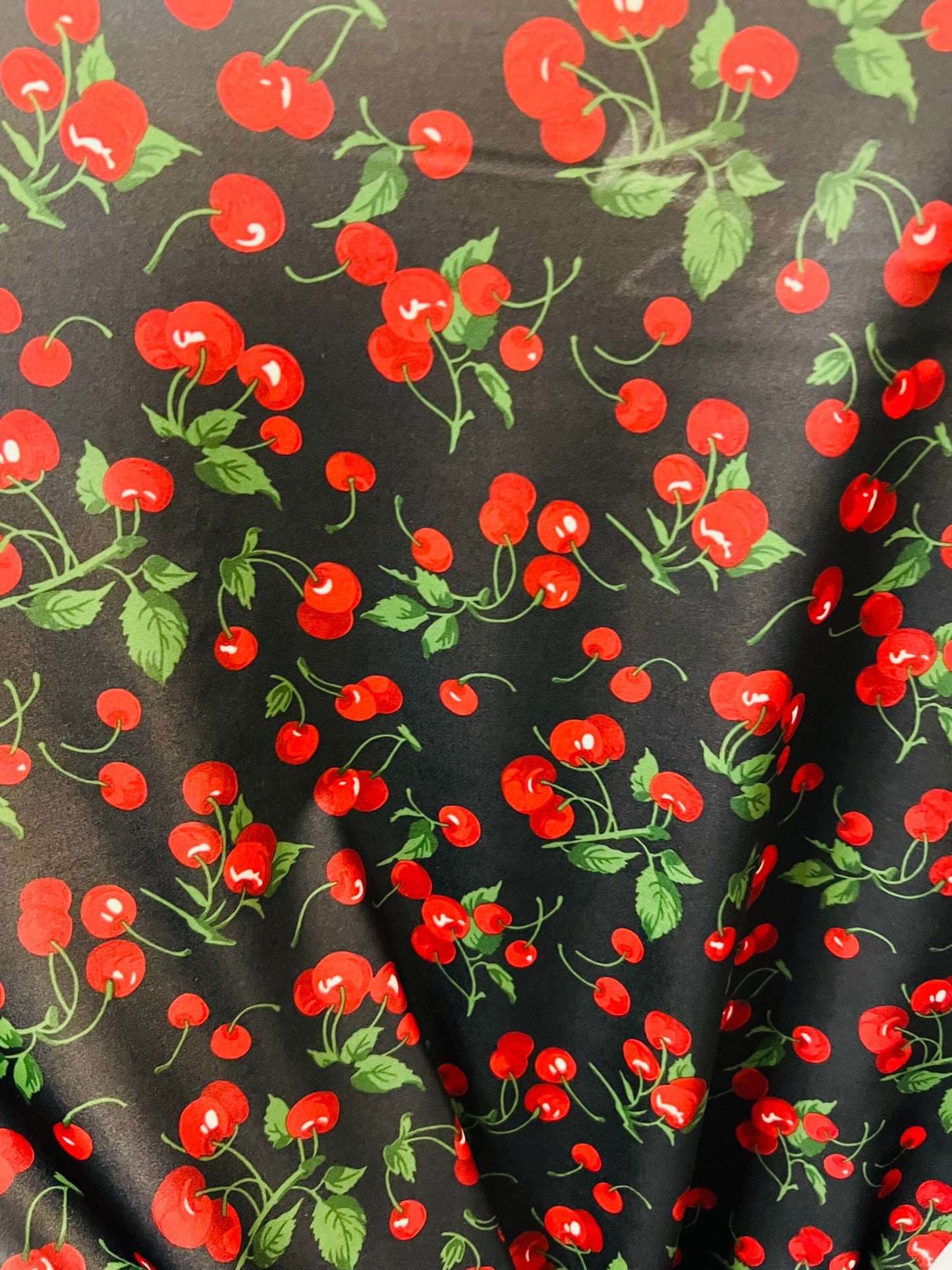 Cherry design Black/Red print on great quality of nylon spandex 4-way stretch 58/60” Sold by the YD. Ships Worldwide from Los Angeles CA