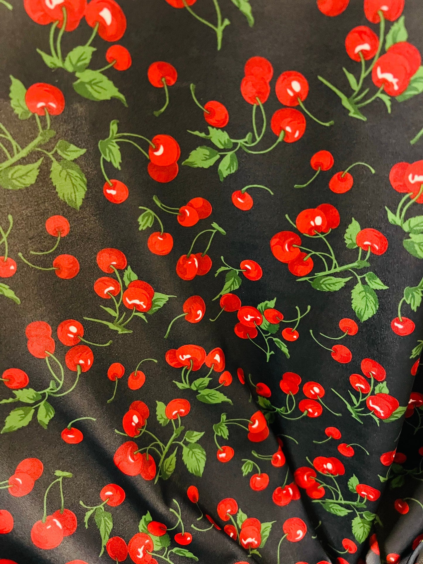 Cherry design Black/Red print on great quality of nylon spandex 4-way stretch 58/60” Sold by the YD. Ships Worldwide from Los Angeles CA