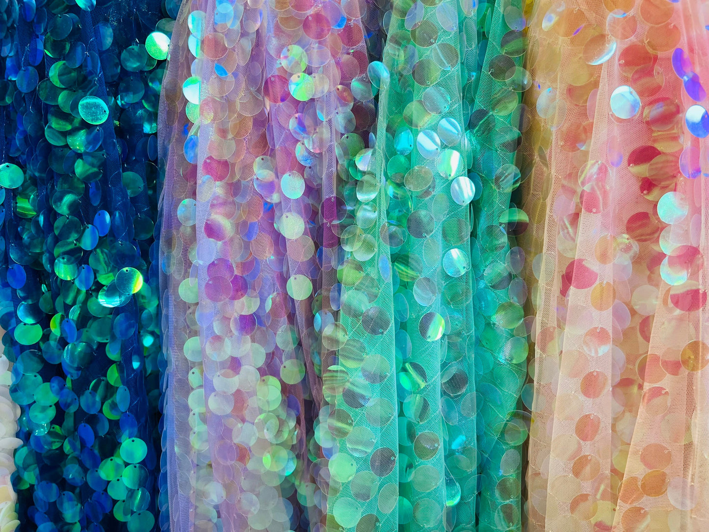 Paillette sequins iridescent multicolors embroidered on stretch mesh base 2-way stretch Sold by the yd ships worldwide