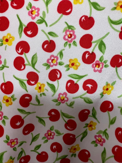 Cherry design White/Red print on great quality of nylon spandex 4-way stretch 58/60” Sold by the YD. Ships Worldwide from Los Angeles Califo