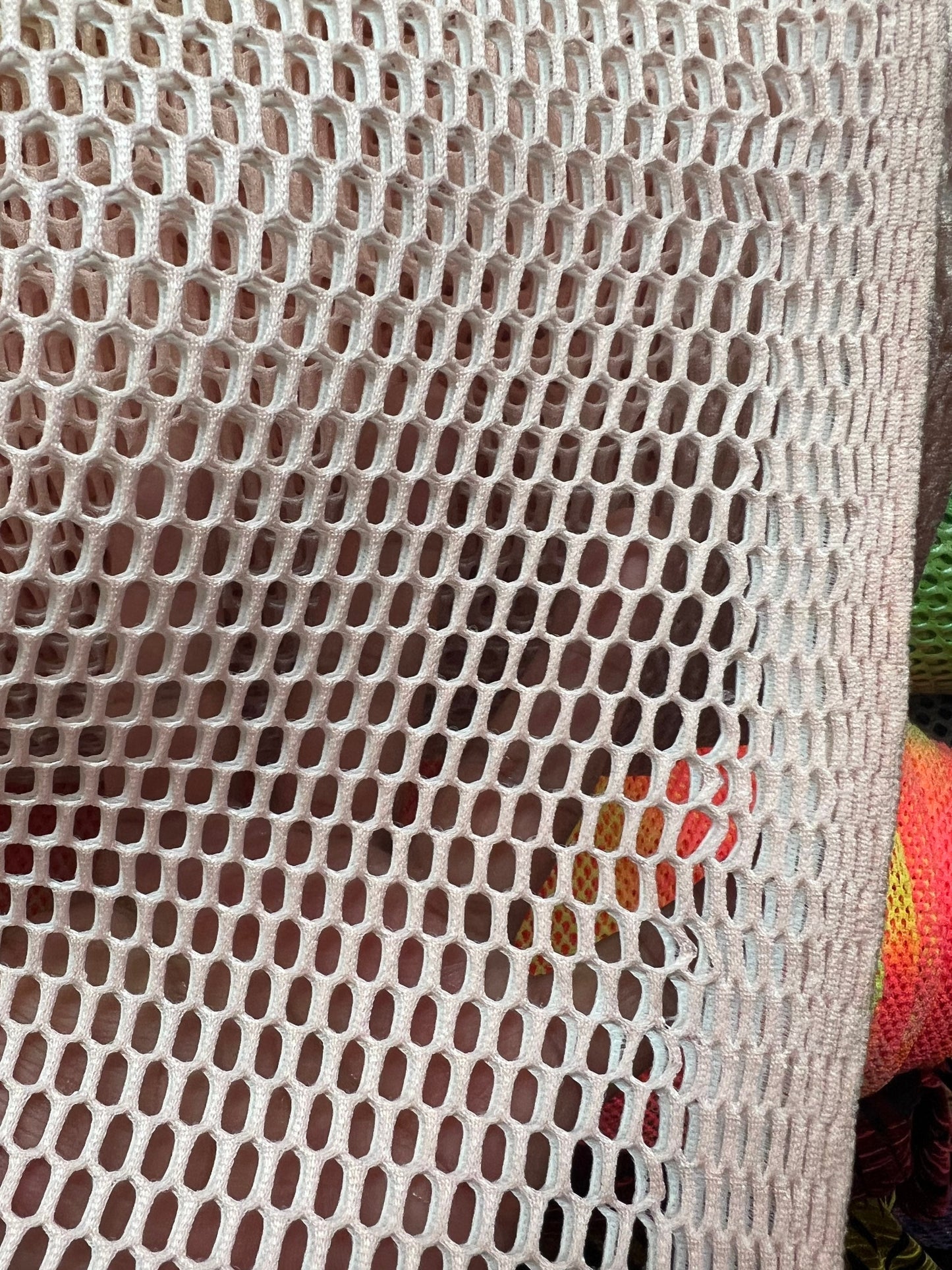 Heavy sport mesh with big holes 2way stretch 58/60" Sold by the YD. Ships worldwide from Los Angeles California USA.