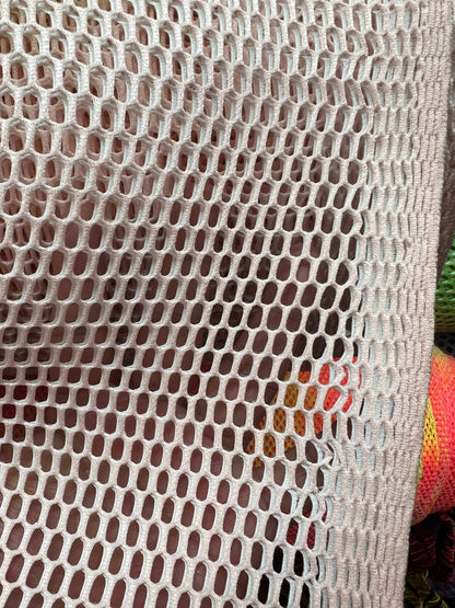 Heavy sport mesh with big holes 2way stretch 58/60" Sold by the YD. Ships worldwide from Los Angeles California USA.