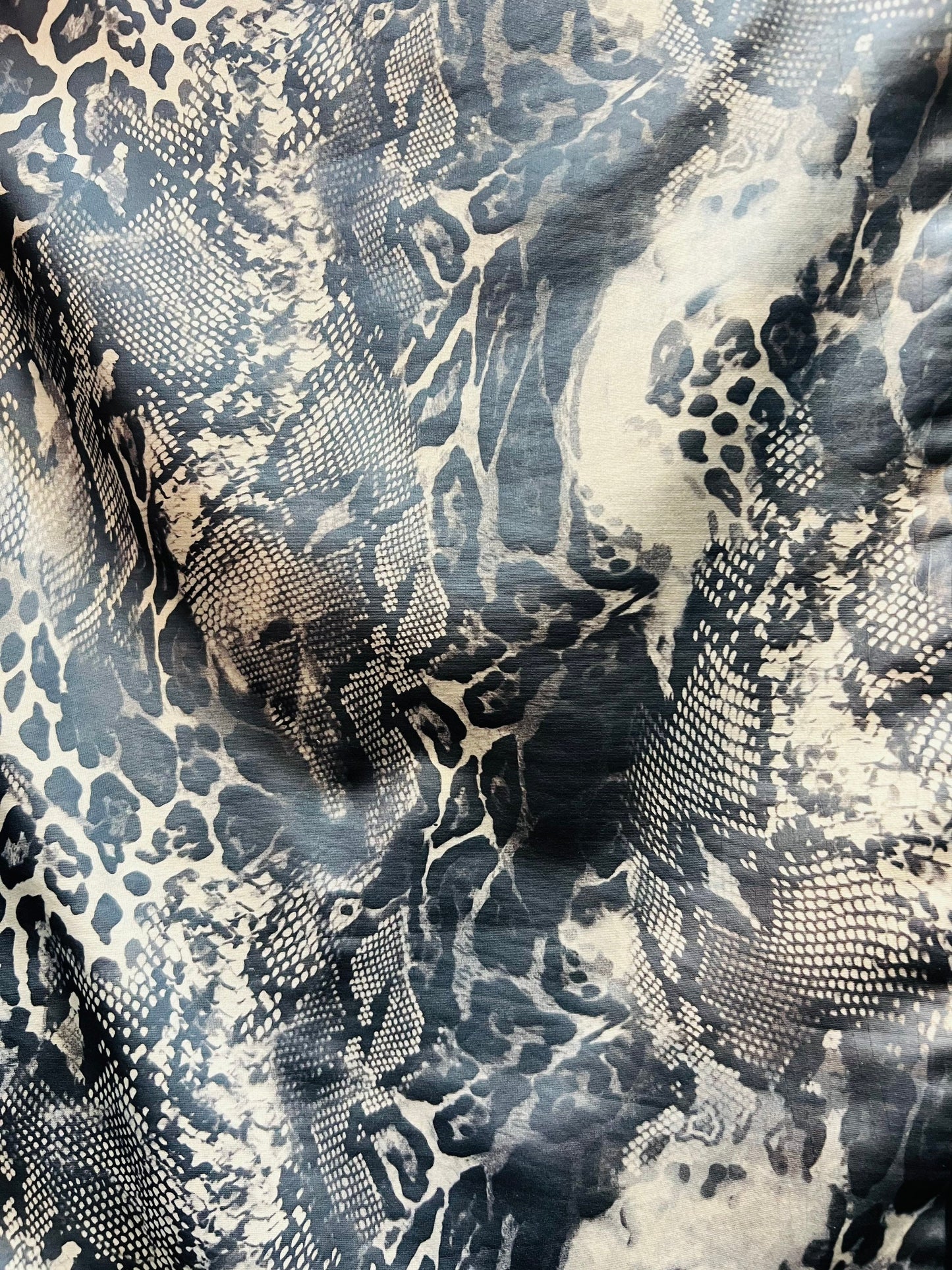 Exotic Multi Animal print on great quality of poly spandex with lame matte foil 2-way stretch 58/60” Sold by the YD.