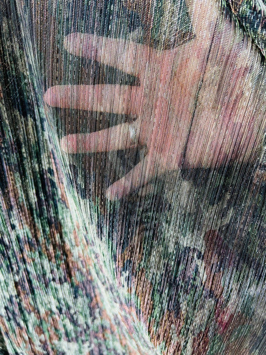 New camouflage design print on metallic mesh pleated 2-way stretch 58/60” Sold by the YD. Ships Worldwide from Los Angeles California USA.