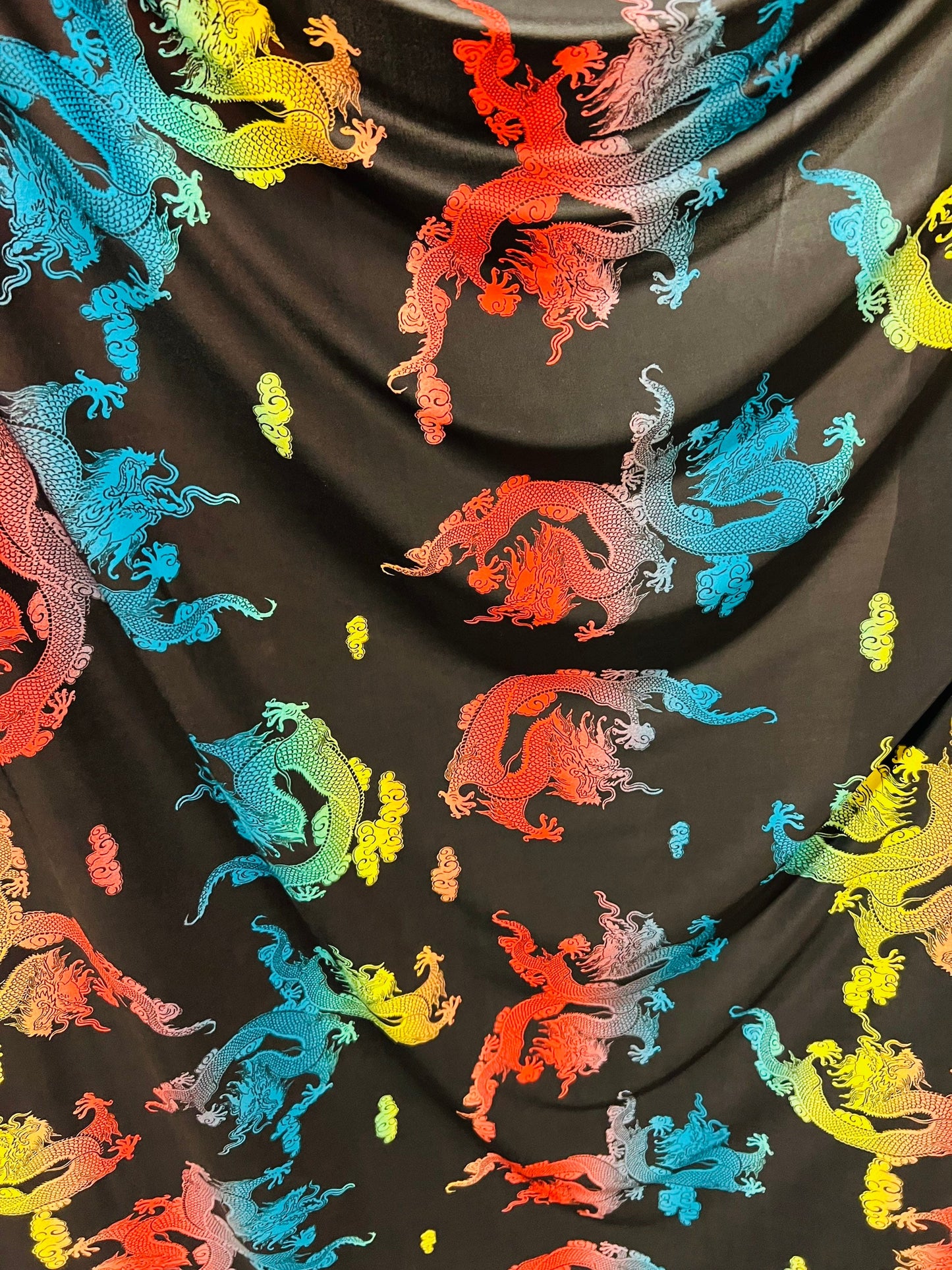 Exotic dragon design print on poly spandex light weight 4-way stretch 58/60” Sold by the YD. Ships Worldwide from Los Angeles California USA