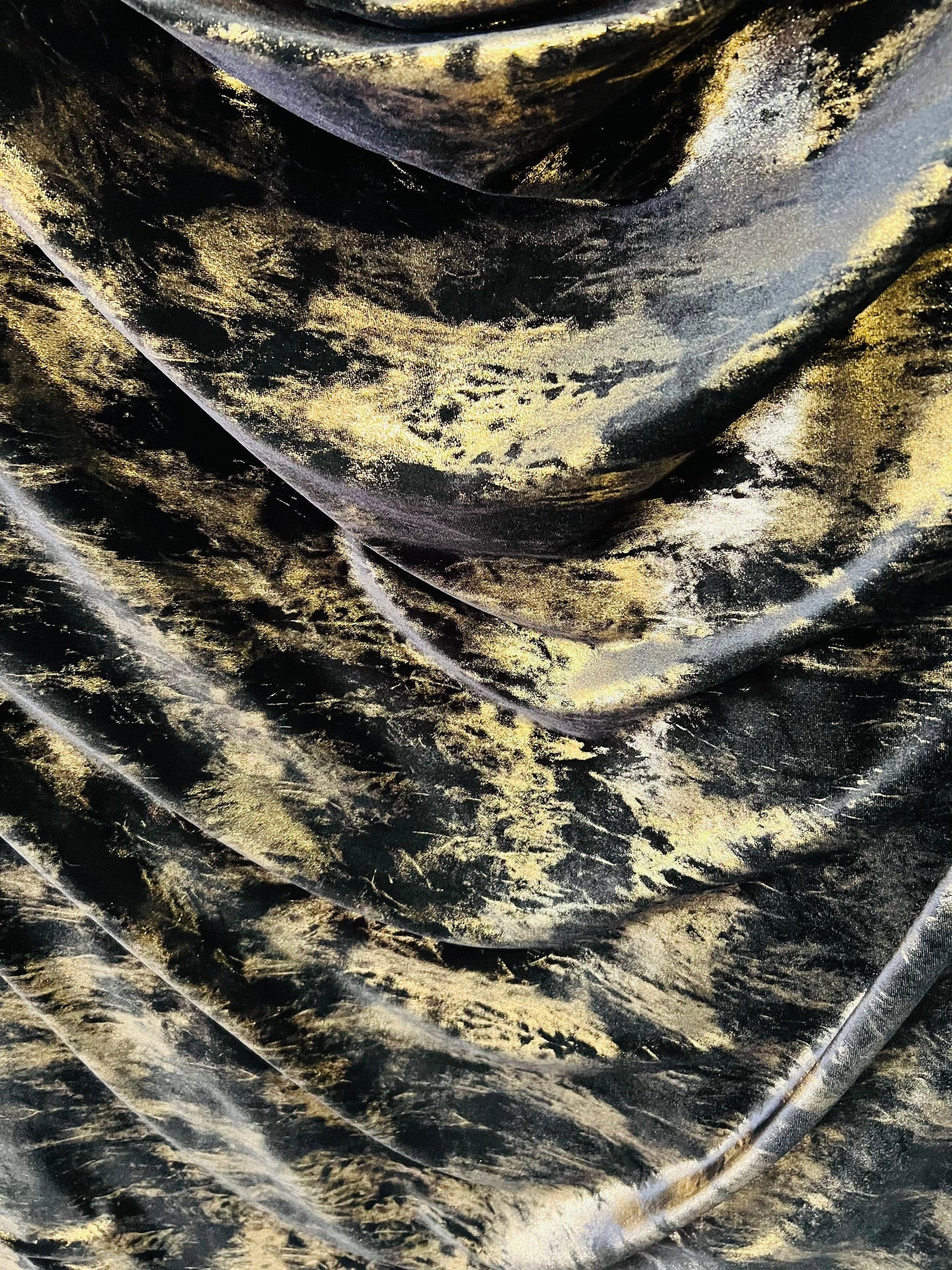 Splatter design New metallic stretch velvet black/gold 4way 58/60” Sold by the YD. Ships worldwide from Los Angeles California USA